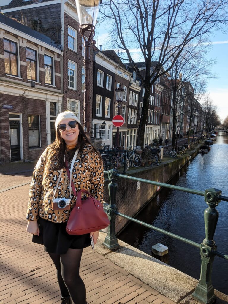 girl next to Amsterdam canal